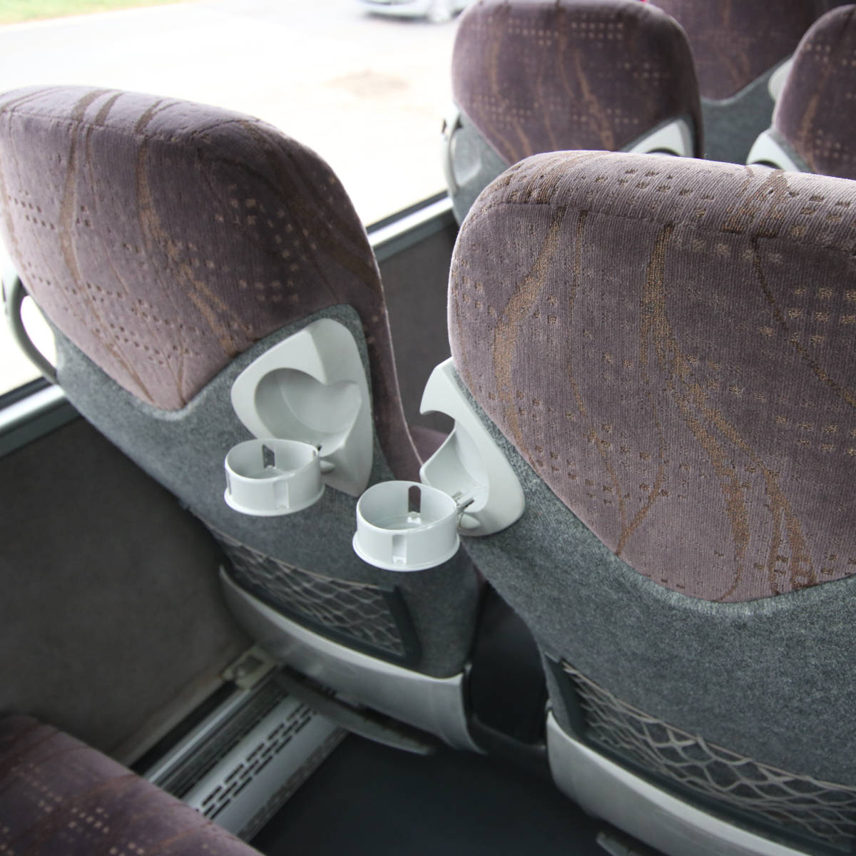 An image of 53 Seat Luxury Coach, Cup Holders Detail goes here.